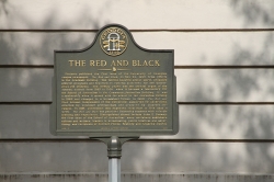 The Red and Black campus sign